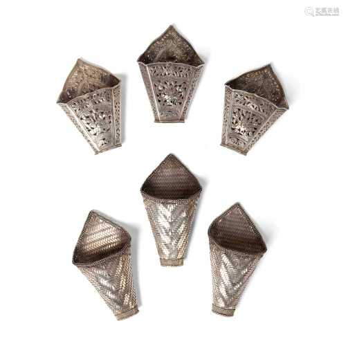 GROUP OF SIX STRAIGHT CHINESE OR SOUTHEAST ASIAN BETEL LEAF HOLDERS 20TH CENTURY