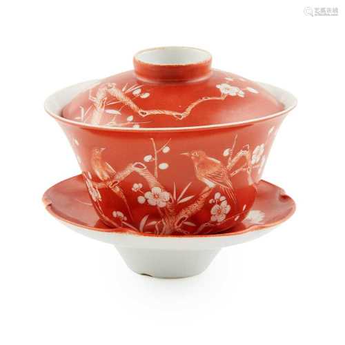 RED-GROUND RESERVE-DECORATED 'PRUNUS' LIDDED CUP AND SAUCER DAOGUANG MARK