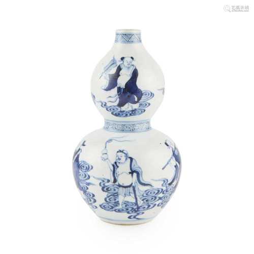 BLUE AND WHITE 'EIGHT IMMORTALS' DOUBLE GOURD VASE QING DYNASTY