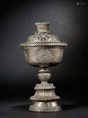 A LARGE SILVER REPOUSSÉ COVERED OFFERING LAMP TIBET, 19TH CENTURY