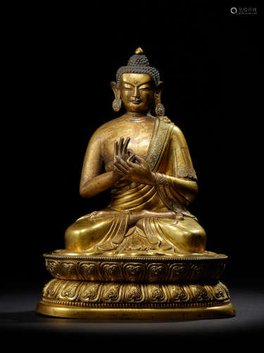 A GILT COPPER ALLOY REPOUSSÉ FIGURE OF BUDDHA QING DYNASTY, 18TH CENTURY