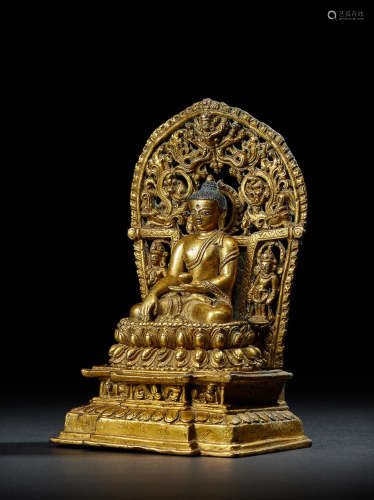 A GILT COPPER ALLOY ENSHRINED BUDDHA NEPAL, 14TH CENTURY