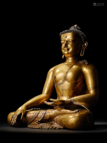 A GILT COPPER ALLOY FIGURE OF BUDDHA SHAKYAMUNI KHASA MALLA, CIRCA 13TH CENTURY