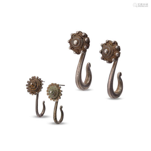 TWO PAIRS OF SILVER FLORAL S-SHAPED EARRINGS SUMATRA, INDONESIA, LATE 19TH-EARLY 20TH CENTURY