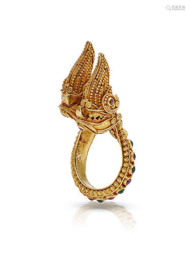 A GEM-SET GOLD NAGA RING BURMA OR THAILAND EARLY 20TH CENTURY