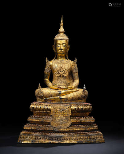 A COPPER ALLOY AND LACQUER GILT FIGURE OF A SEATED CROWNED BUDDHA Bangkok/Rattanakosin first period 1782-1851 CE