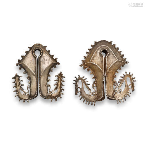 TWO WEST SUMBA SILVER EAR ORNAMENTS, MAMULI EAST NUSA TENGGARA, INDONESIA, 19TH-20TH CENTURY