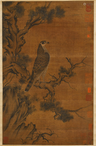 A SCROLL PAINTING OF AN EAGLE AND PINES