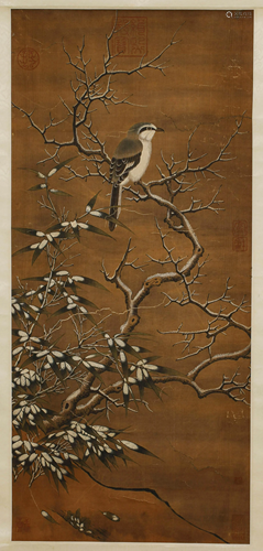 A SCROLL PAINTING OF A BIRD IN THE TREE