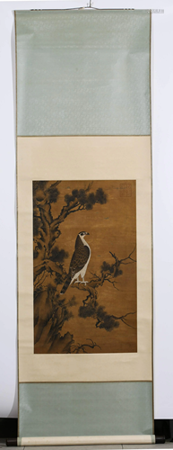 A SCROLL PAINTING OF AN EAGLE AND PINES