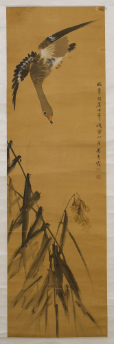 A SCROLL PAINTING OF A BIRD BY WU QING XIA