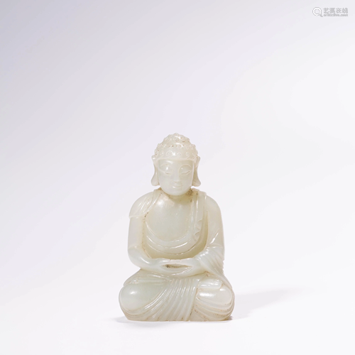 A WHITE JADE BUDDHA