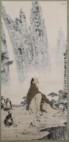 A SCROLL PAINTING OF A PEOPLE IN MOUNTAINOUS AREA BY