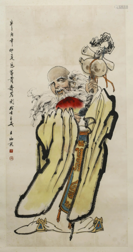 A SCROLL PAINTING OF THE GOD OF LONGEVITY BY WANG XI