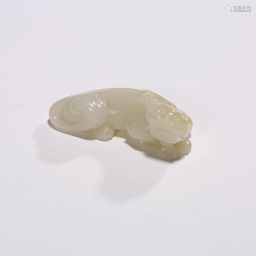 A WHITE JADE RECUMBENT ANIMAL