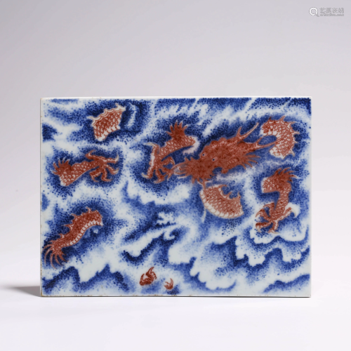 A WHITE AND BLUE UNDERGLAZED RED DRAGON PANEL