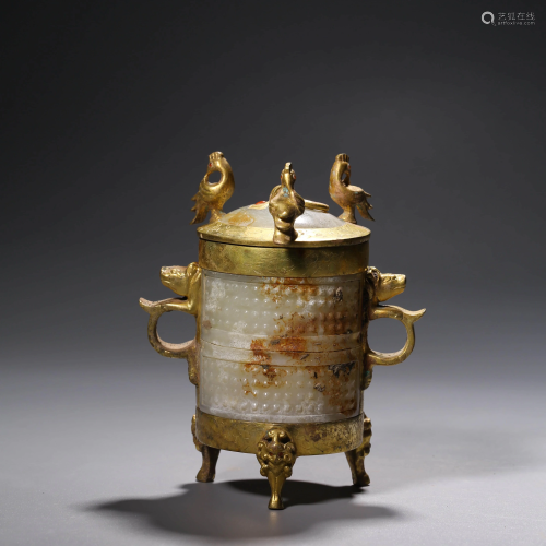 A TRIPOT GILT-BRONZE AND JADE STORAGE VESSEL WITH