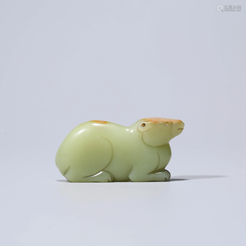 A YELLOW JADE RAT