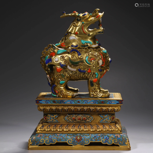 A GILT-BRONZE QI LIN WITH A CLOISONNE ENAMEL STAND