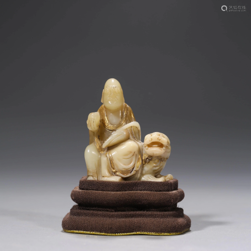 A SOAPSTONE BUDDHA AND ANIMAL WITH STAND