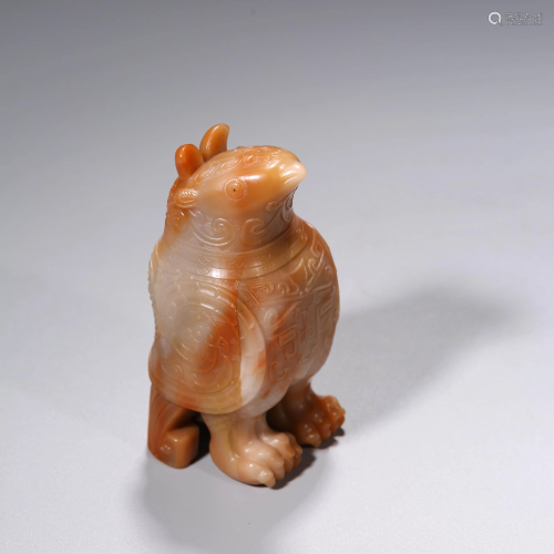 AN ARCHIASTIC SOAPSTONE ANIMAL WITH INSCRIPTIONS