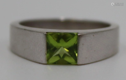 JEWELRY. Cartier 18kt Gold and Peridot Ring.