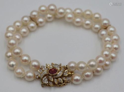 JEWELRY. Double Strand Pearl Bracelet with 14kt