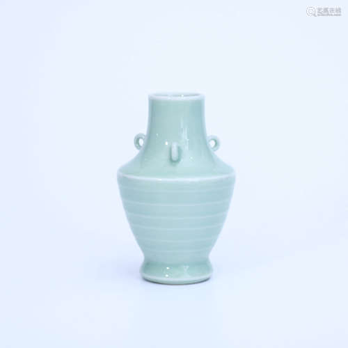 A CELADON-GLAZED XUAN PATTERN PORCELAIN ZUN