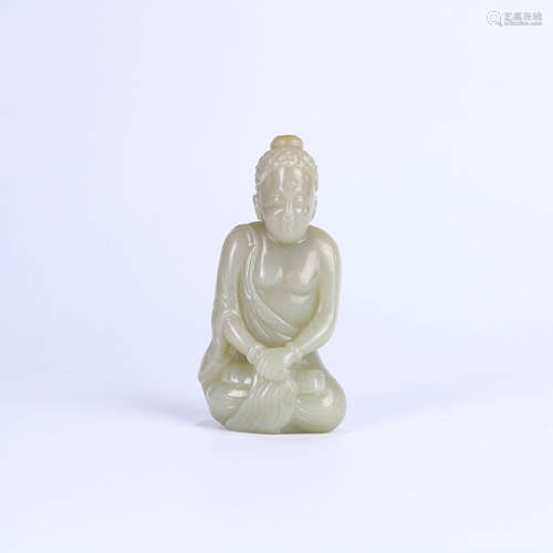 A HETIAN JADE CARVED BUDDHA ORNAMENT