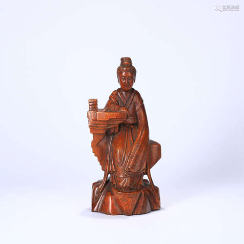 A BAMBOO CARVED GUANYIN STATUE