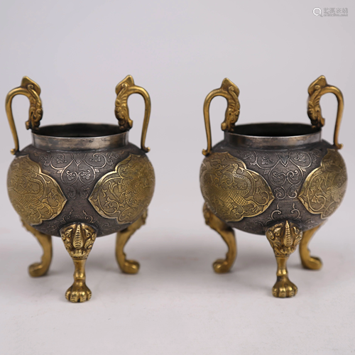 A pair of silver gilt incense burners from the 18th