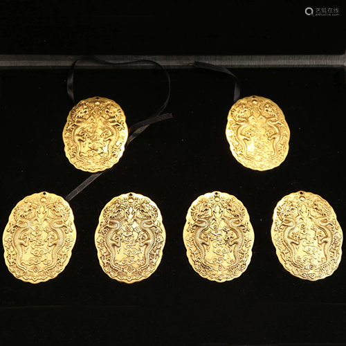 A set of 18th century gilt tokens