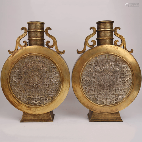 A pair of gilt and silver flat vases, 18th century