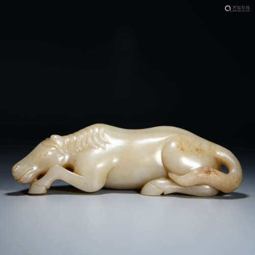 A WHITE JADE CARVED HORSE ORNAMENT