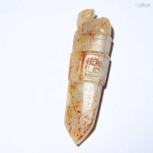 A WHITE JADE CARVED BEAST HANDLE ORNAMENT