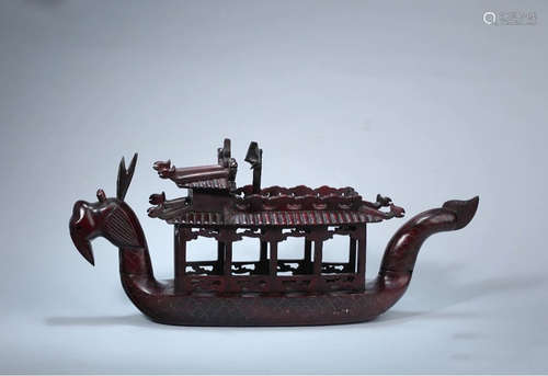 HUALI WOOD CARVED AND SILVER INLAID 'DRAGON BOAT' FIGURE