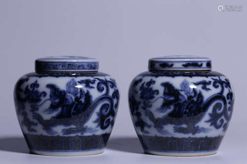 PAIR OF BLUE AND WHITE 'CHILONG' JARS WITH COVERS