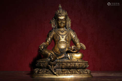 GILT BRONZE CAST 'YELLOW JAMBHALA' SEATED FIGURE