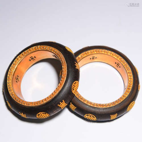 A PAIR OF GOLD INLAID EAGLEWOOD BRACELETS