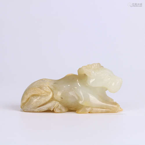 A HETIAN JADE CARVED OX ORNAMENT