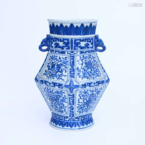 A BLUE AND WHITE EIGHT TEASURE PATTERN PORCELAIN DOUBLE EARS ZUN