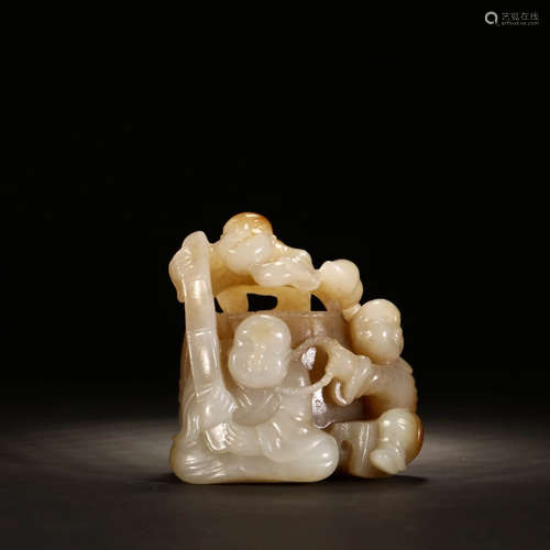 A HETIAN JADE CARVED BOY ORNAMENT