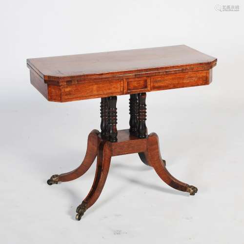 A 19th century rosewood and satinwood banded card table, the hinged rectangular top with canted