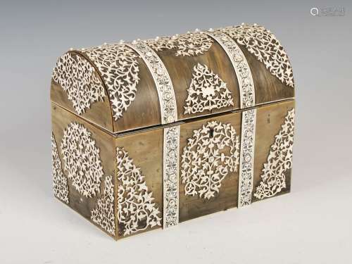 A late 19th century Anglo Indian sandalwood, horn and ivory overlaid stationery casket, the domed