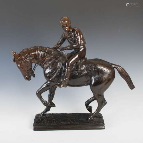 A late 19th/early 20th century bronze figure group of jockey on horseback, on rectangular plinth