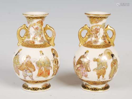 A pair of miniature Japanese Satsuma pottery twin handled bottle vases, Meiji Period, decorated with