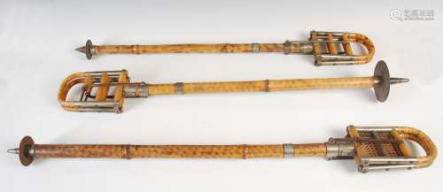 Three assorted Edwardian Country House bamboo and white metal mounted shooting sticks, one with