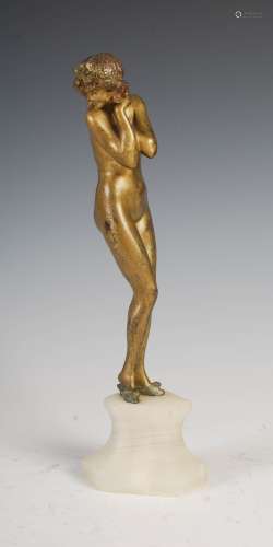 Claire Colinet (1880-1950) - An early 20th century gilt bronze figure of a nude, modelled standing