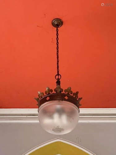 A late 19th/ early 20th century brass and frosted glass hanging light, with fleur-de-lys and pierced