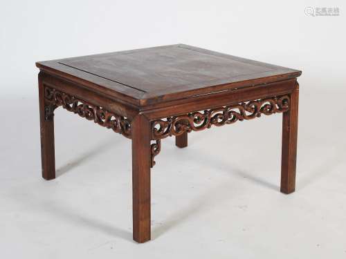 A Chinese dark wood square shaped low table, late 19th/early 20th century, the panelled